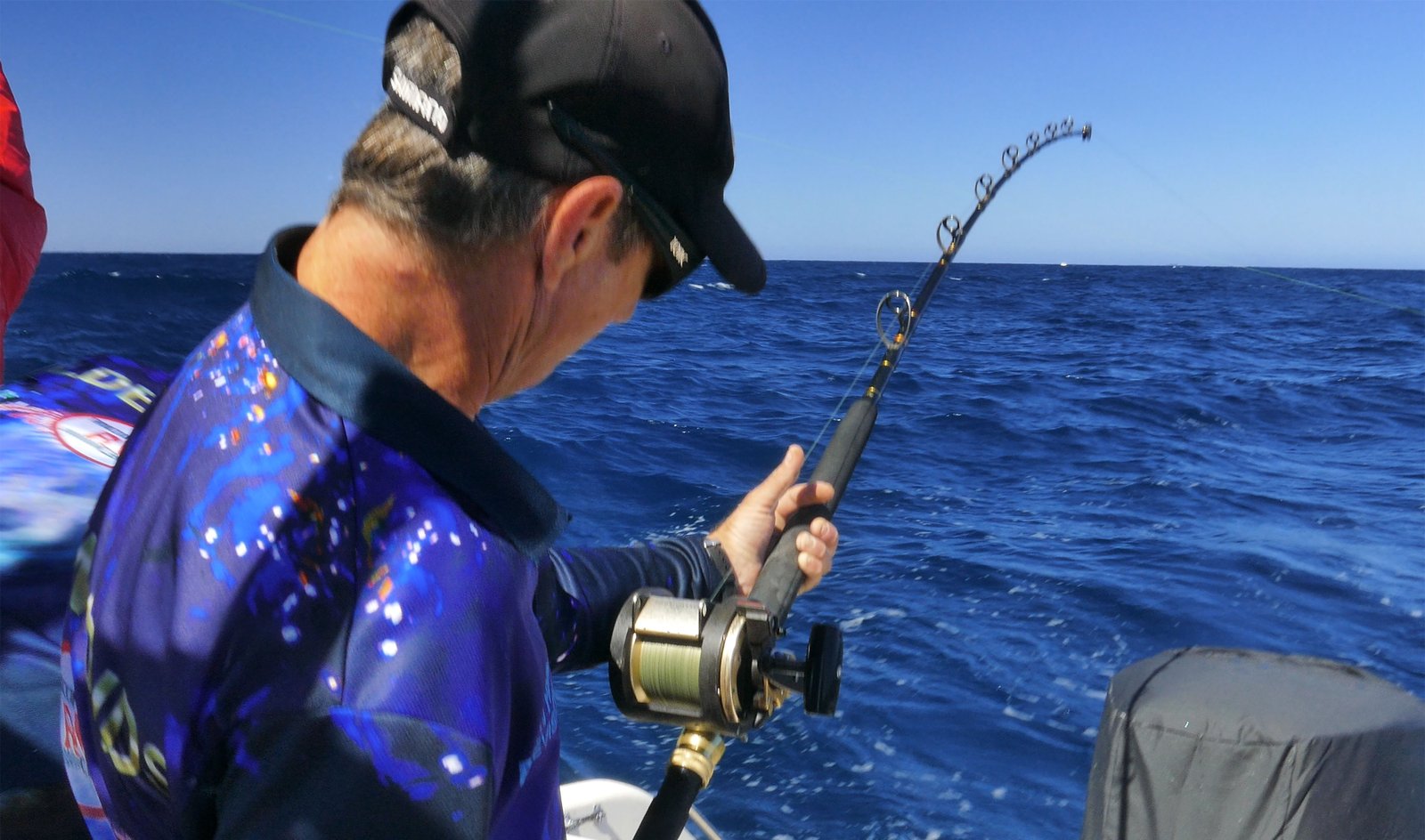 Nick Hocking hooked up to a HUGE Rottnest Island Kingfish